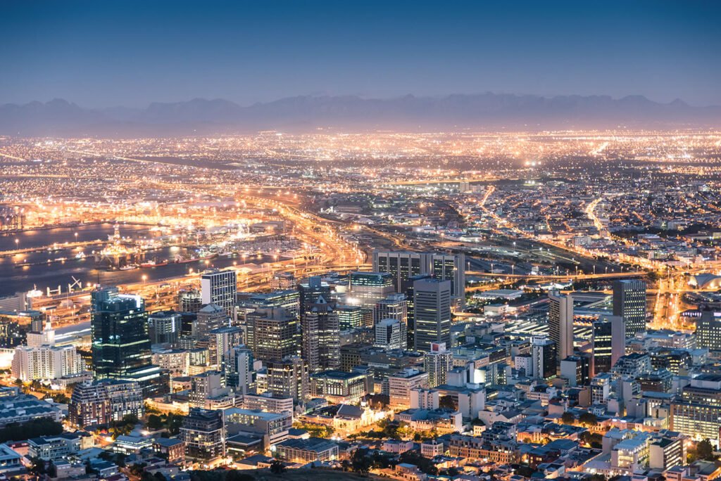 Aerial view of Cape Town from Signal Hill after sunset Aerial view of Cape Town from Signal Hill after sunset during the blue hour - South Africa modern city with spectacular nightscape panorama